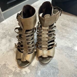 Elizabeth and James Metallic gladiator heels.